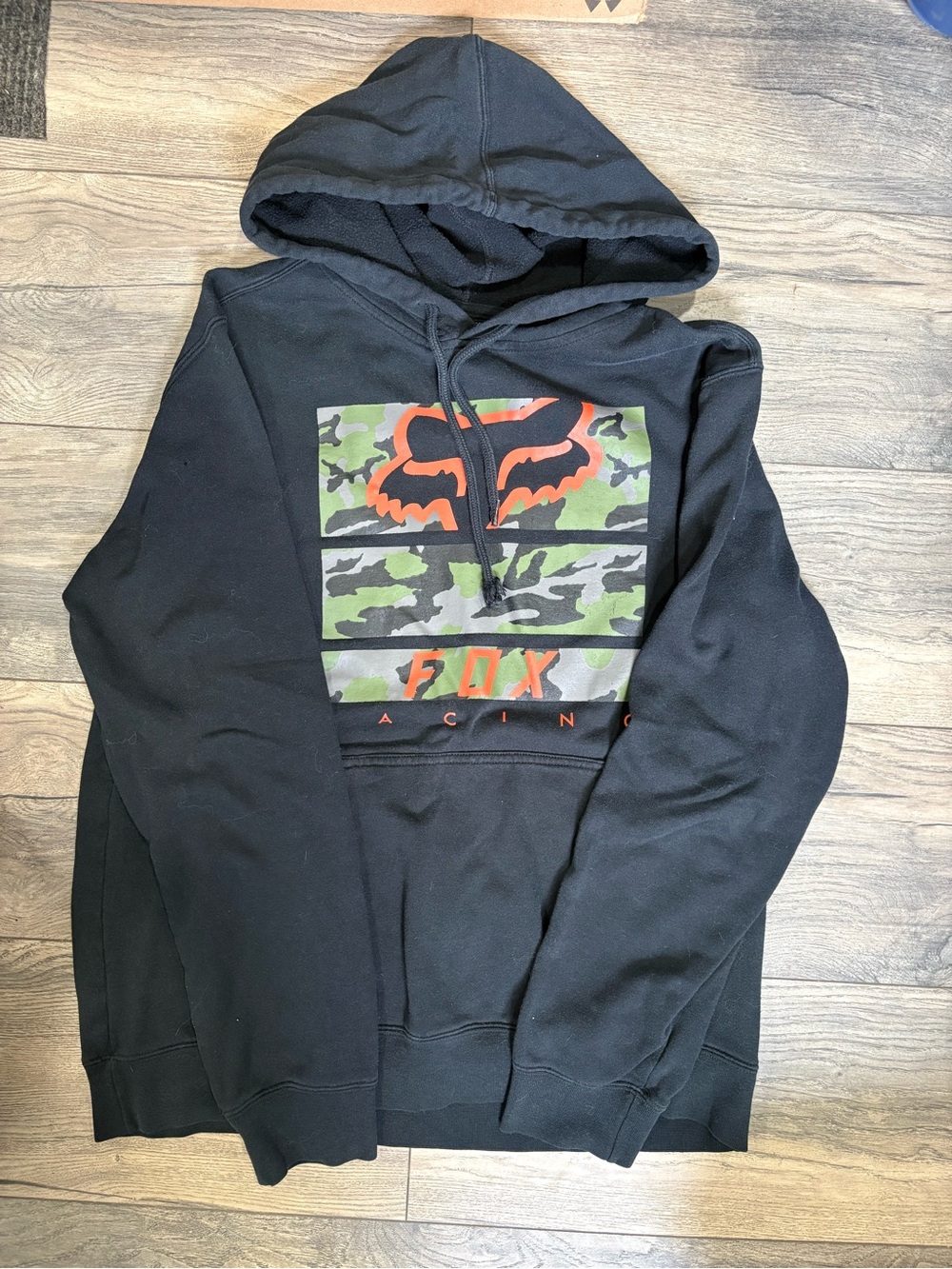 Fox Black Hoodie with Orange-Accented Camo Logo